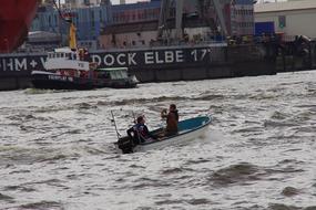 fishing boat in the background of the port