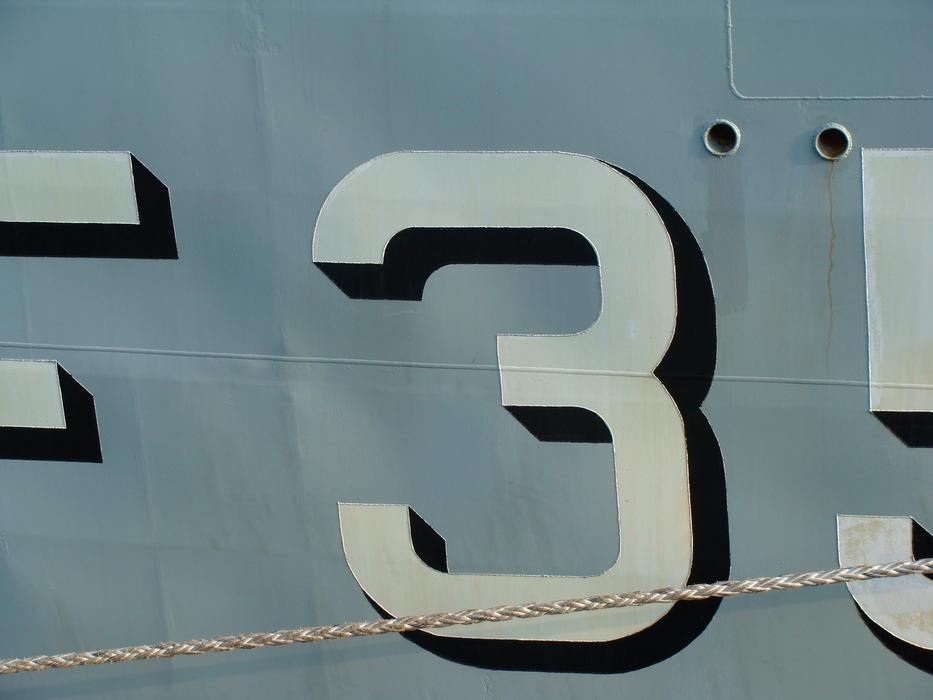 figures on the ship close-up