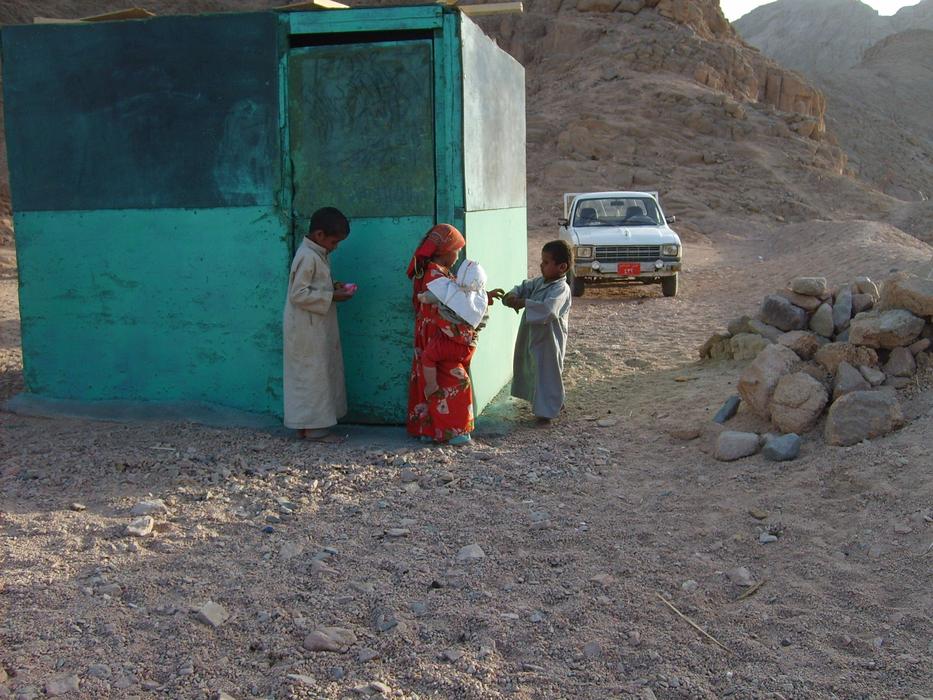 children playing in the desert of egypt