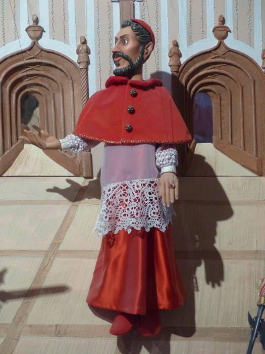 archbishop as a doll