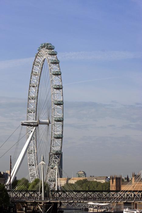 Ferris wheel in the city against the sky