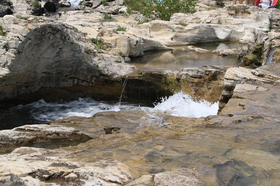 Beautiful Waterfalls of Sautadet near the plants, in France