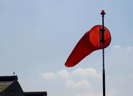 Orange Windsock Pole at Blue sky
