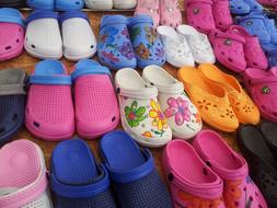 lot of colorful Rubber Shoes for children