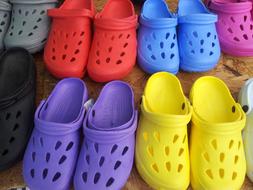 Close-up of the colorful pairs of garden shoes