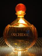 Perfume Bottle close-up in the play of light