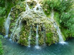 waterfall on a rock near the sea