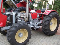 red farm tractor wheels