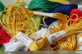 pile of bright colored Embroidery threads