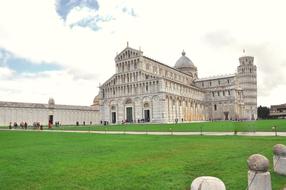 Beautiful landscape with the architecture among the green grass, in Pisa, Italy