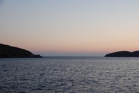 island near the sea at dawn