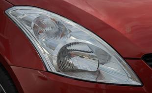 Close-up of the spotlight of the red car