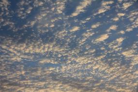 feather light clouds in the sky