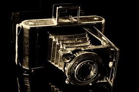 Retro, old camera, with reflection, at black background, clipart