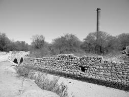 black and white, bridge, stone wall and chimney