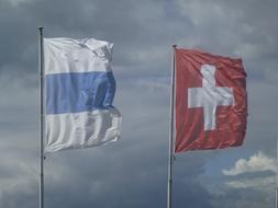 switzerland flags in the wind