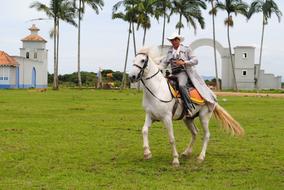 cowboy on a white horse in Beto Carrero park