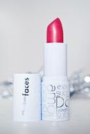 Close-up of the glossy lipstick, with words