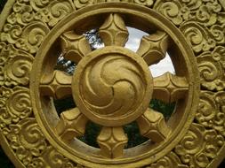 golden symbol on a monastery in tibet