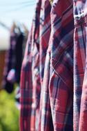 shirt on a clothesline on the street on a blurred background