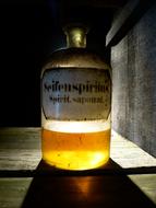 old Glass Bottle with Seifenspiritus, Spiritus Saponatus
