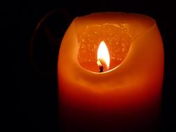 Wax Candle Flame at dark