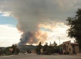 forest fire near buildings