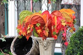 Colorful Autumn Deco in ceramic vase outdoor