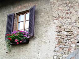 Window Balcony on stone building Italy