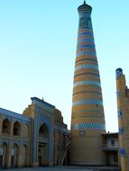 Beautiful and colorful Khoja Minaret in Khiva Uzbekistan, under the blue sky