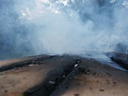 Close-up of the the wood, in smoke