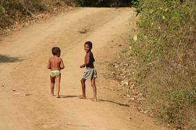 African children walking along the road