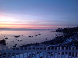 rocky seaside during sunset