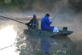 river fishing in the morning haze