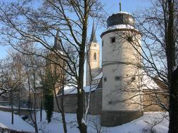 Beautiful buildings and plants in snow, in Iphofen, Franconian Wine Country, Germany