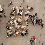 Top view with the people at the gastronomy dining tables