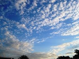 white clouds in the bright sky