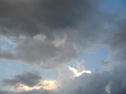 light in gray big clouds