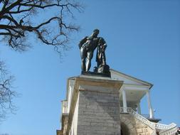 Statue Hercules Ancient against the blue sky