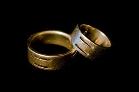 pair of rings on a black background