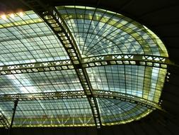 Close-up of the colorful and beautiful, shiny glass roof of the museum, among the shadows