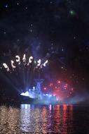 Fireworks over the harbor at night