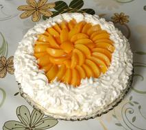 cake with cream and peaches