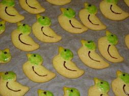 Beautiful, yellow and green duck cookies with chocolate