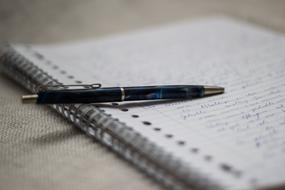pen for notes in blurred background