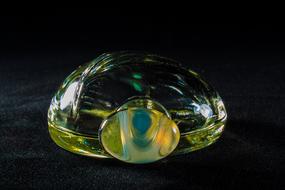Perfume in Glass Bottle at dark background