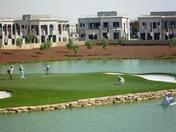 people in a golf club in Dubai