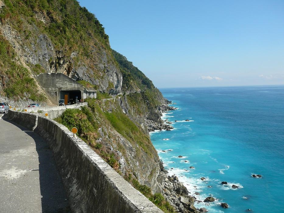 road on a mountain near the sea in taiwan