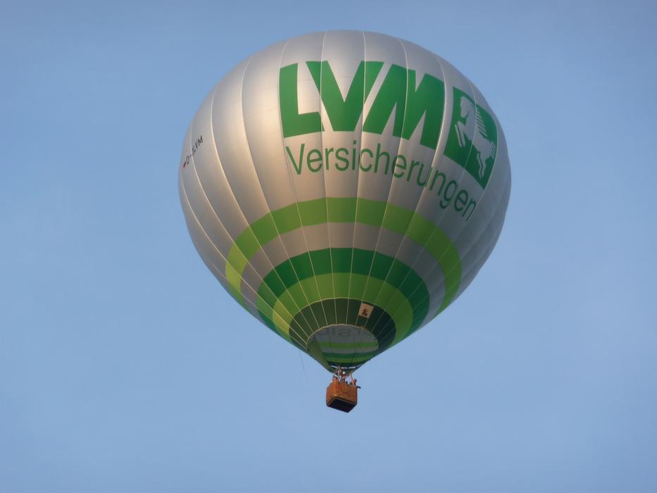 grey Hot Air balloon with lvm logo at Sky