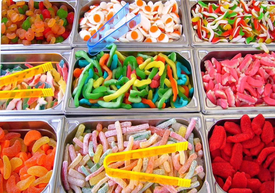 Colorful and beautiful, different candies in the pick and mix containers